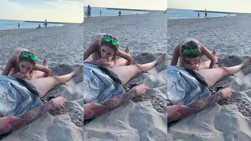 sucking my friend on the beach while he’s having a phone call.