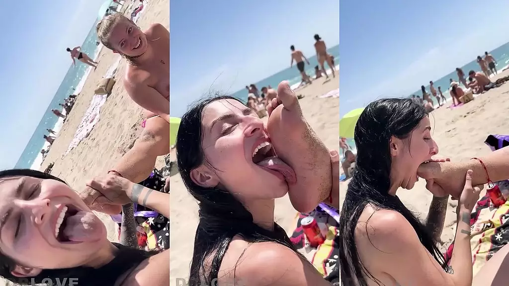 kaitlyn cleans venom´s foot at the beach